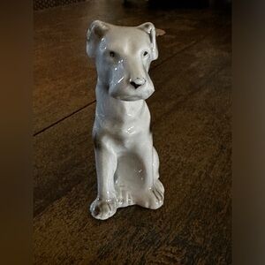 Vintage ceramic black and white sitting dog figurine